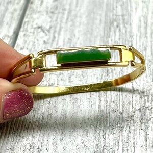 150. Stunning vintage signed Avon imitation jade bracelet.